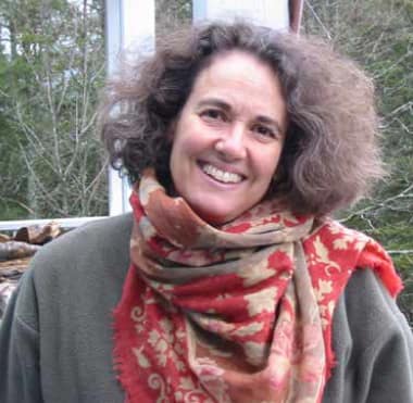 image of the author outside her home